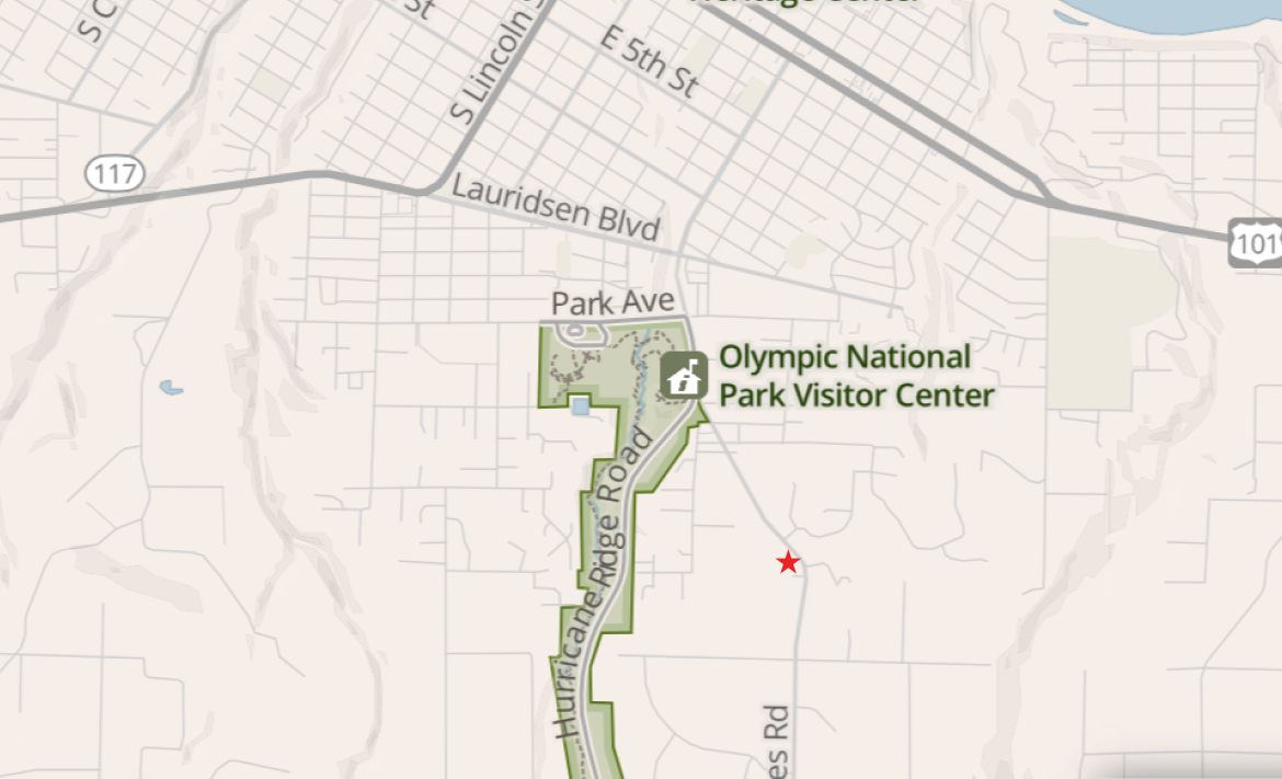 Map showing Lunch Rock just south of the Olympic National Park Visitor Center off Hurricane Ridge Road in Port Angeles, marked with a red star.
